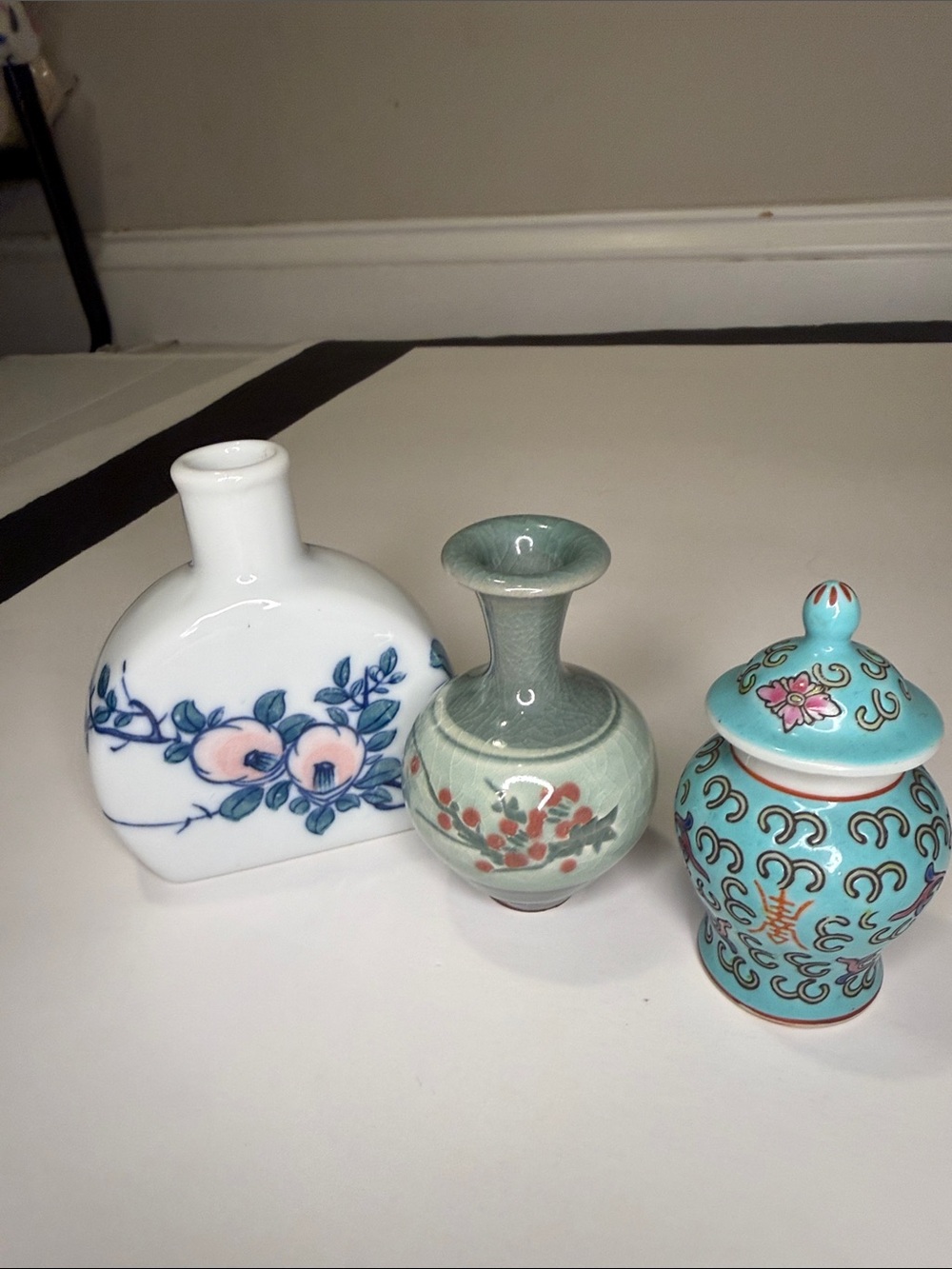 Three Decorative Ceramic Vases in White and Celadon